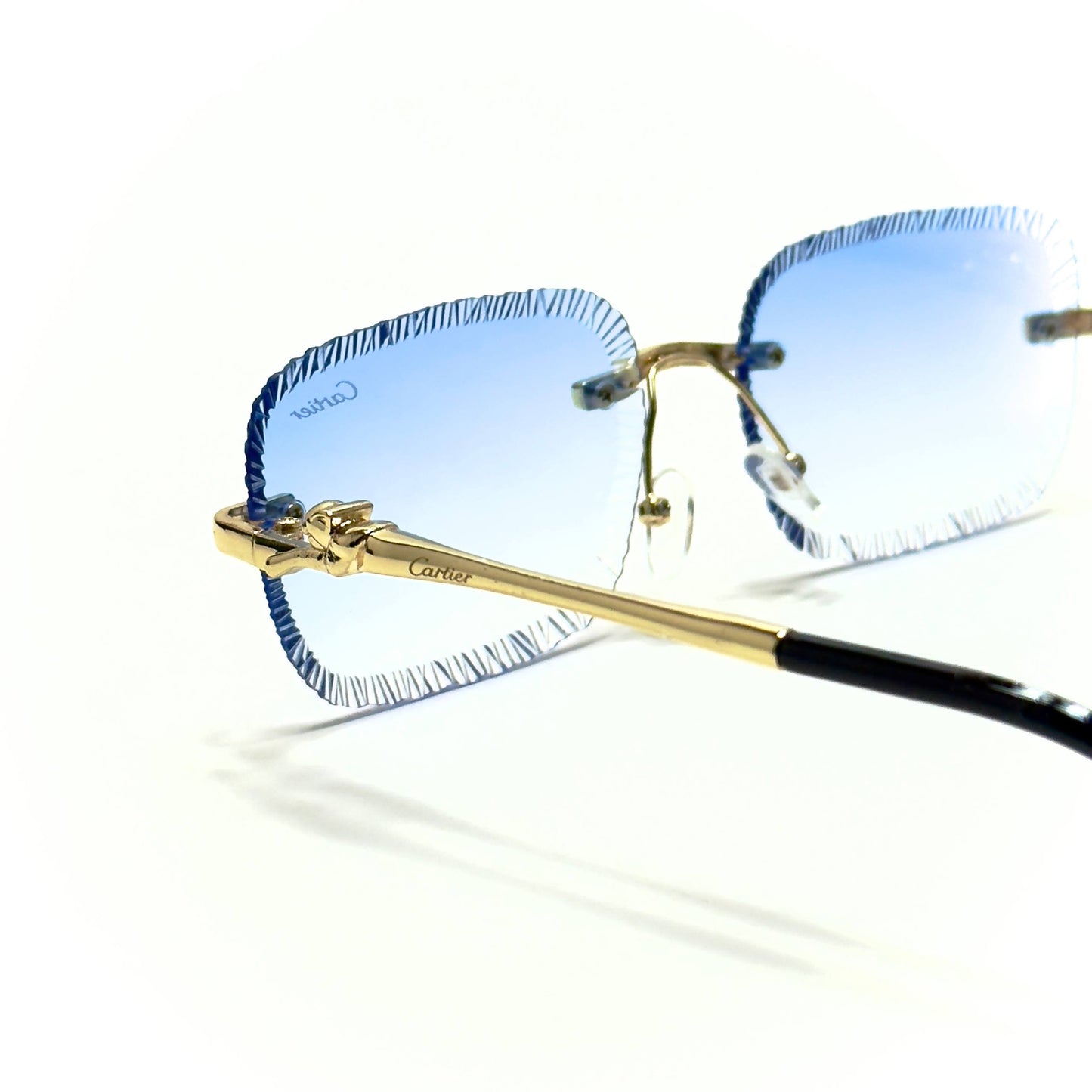 Cartier CT0425S Rimless – Gold Blue Gradient