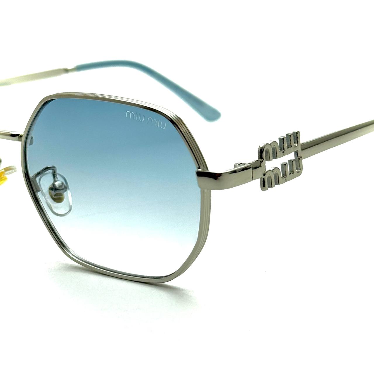 Miu Miu MU 56QS – Silver Frame / Light Blue Gradient